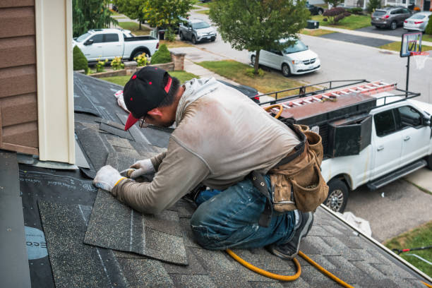 Professional Roofing technician working in Whitehall, MI